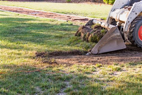 how to grade yard with skid steer|grading driveway with skid steer.